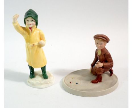 A Wedgwood group of boy playing marbles and a Doughty figure fisherman, 12cm