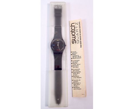 A Swatch 'Don't Be Too Late' quartz watch in original case with paperwork, dated 1985