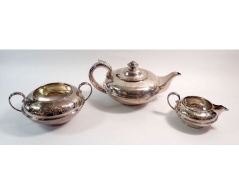 A Georgian silver teapot with engraved decoration and inscription, London 1829 by Charles Fox II, 637g with matching silver p