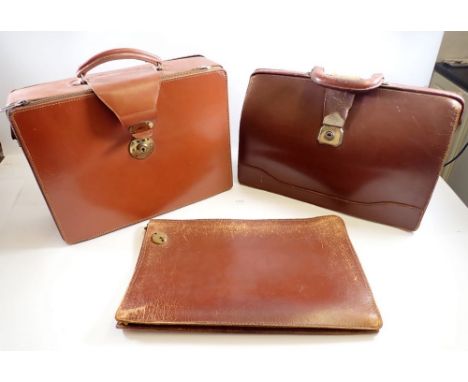 Two leather vintage brief cases and a document wallet 