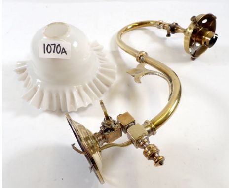 A 19th century French brass gas wall light converted for electric with frilled milk glass shade 