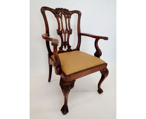 A Chippendale style mahogany carver chair with carved decoration 