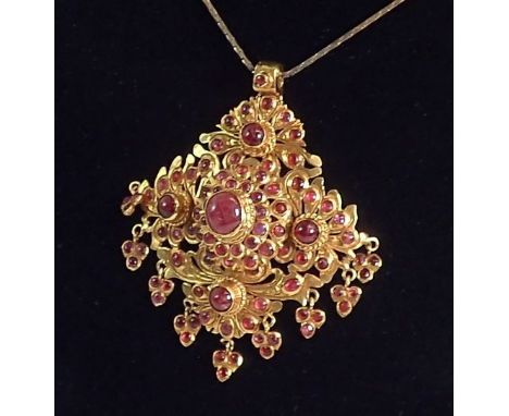 An Indian high grade gold square openwork pendant set multiple cabochon rubies with cabochon ruby drops, 6.5 x 6cm, 29g