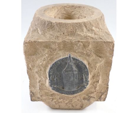 A fragment of stone from The Houses of Parliament with cast bronze plaque - from bomb damage in 1941, 18cm tall