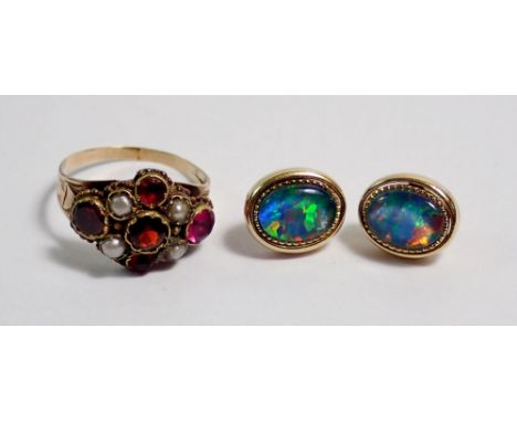 An antique yellow metal ring set pearls and paste, size H, 1.5g and a pair of silver gilt and opal earrings