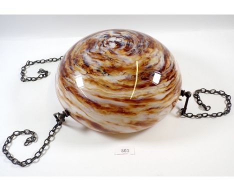 A vintage mottled dome glass ceiling light shade with original metal chain fittings, 25cm diameter