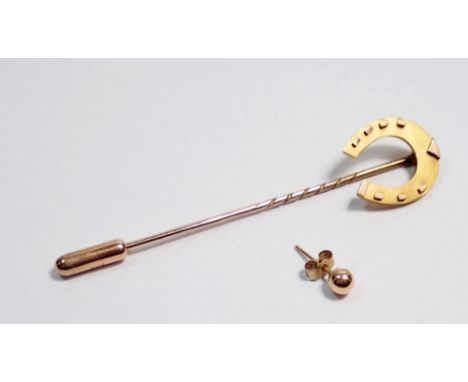 A 15 carat gold horseshoe stick pin etc. 1.8g 