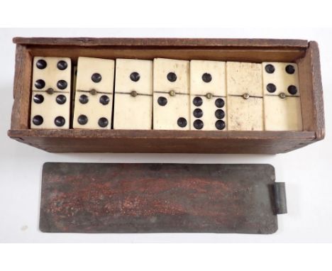 A set of antique bone and ebony dominoes in wooden box (28) 