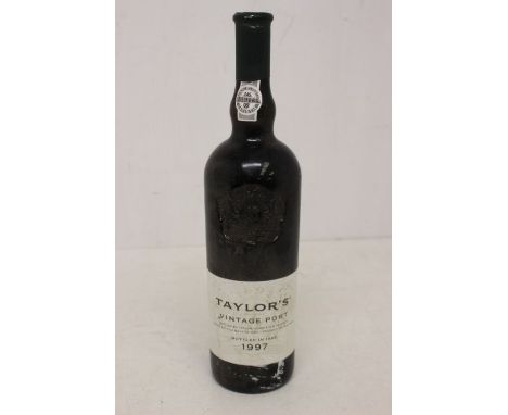A Bottle Of Taylor's Vintage Port 1997 Bottled In 1999. Bottle Is In Good Overall Condition Still Sealed Signs Of Bin Soiling
