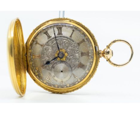 A mid 19th Century 18ct gold hunter pocket watch by W.M Harris & Co London , silvered dial with applied gold tone numeral mar