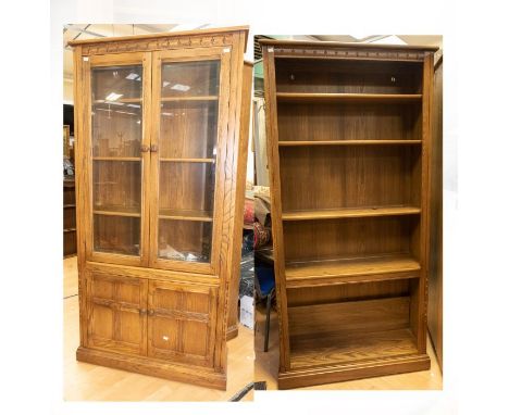 An Ercol two door glazed bookcase, double door cupboard, bookcase fitted with three shelves, approx 93cm wide x 197cm high x 