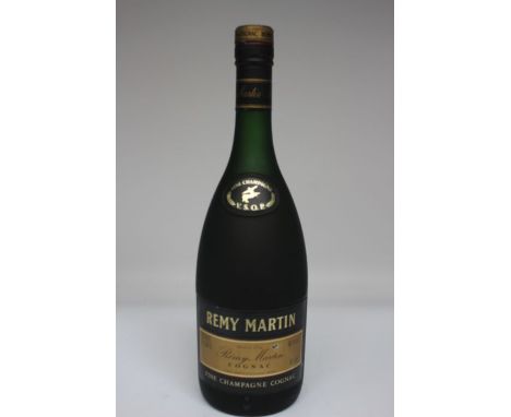 A Bottle Of Remy Martin Fine Cognac Champagne 40 % VOL 68cl Bottle Is In Good Overall Condition There Is A Slight Scuff To Fr