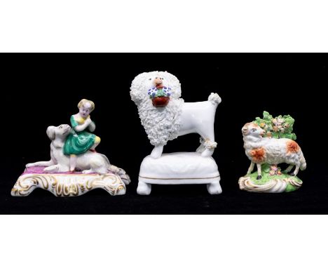 A group of ceramics to include: a Derby, circa 1800, small model of a ram with bocage behind, on naturalistic base, 7 cm long