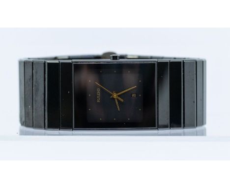 A Gent's Rado black ceramic Diastar wristwatch, comprising a rectangular black dial with gold tone dot markers and hands, dat