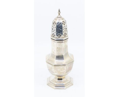 A large George I style silver octagonal caster, pierced domed cover with baluster finial, hallmarked Barker Brothers, Chester