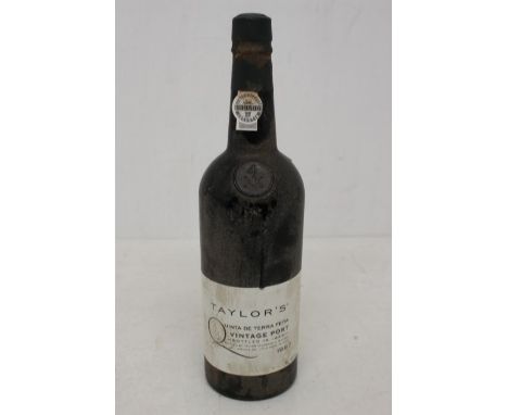A Bottle Of Taylor's Quinta De Terra Feita Vintage Port 1987 Bottled In 1989Bottle Is Still Sealed And Is Bin Soiled With Scu