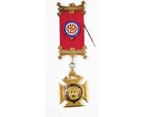 9ct gold and enamel Royal Antediluvian Order of Buffaloes medal, the buffalo with ruby cabochon eyes, with ribbon and clasps,