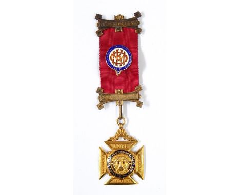 9ct gold and enamel Royal Antediluvian Order of Buffaloes medal, the buffalo with ruby cabochon eyes, with ribbon and clasps,