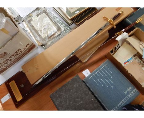 Two reproduction presentation swords with certificates, one by Wilkinson Sword, marked King Edward IV, Victor of the Battle o