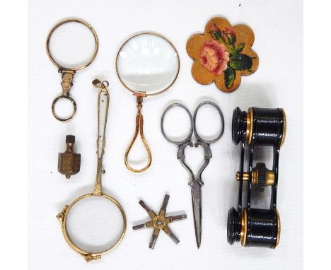 Small pair of opera glasses in leather case, a mother-of-pearl handled and yellow metal framed magnifying glass, reading glas