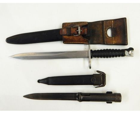 Swiss 1957 pattern bayonet with scabbard and frog, and a socket bayonet and scabbard (2) 