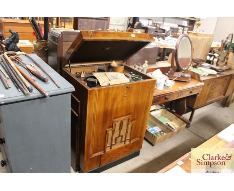 An HMV model 532 walnut cased radiogram with accessories 