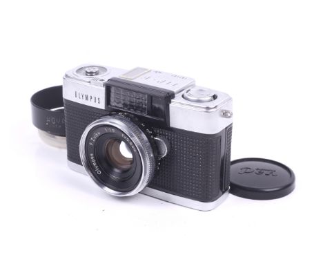 An Olympus Pen D 35mm half frame viewfinder camera. With an Olympus 32mm f1.9 F.Zuiko lens, lens cap, lens hood, ever ready c