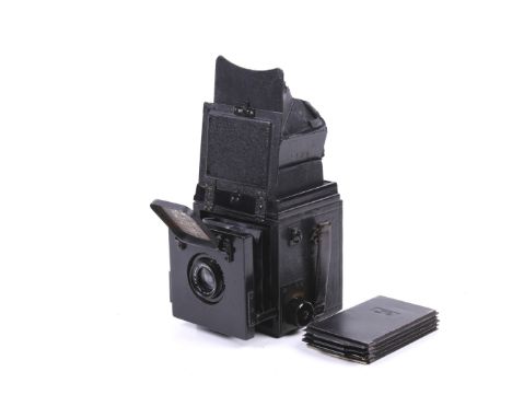 A Thornton Pickard Ruby Horizontal reflex plate camera. With a Dallmeyer London 4 inch f4.5 Anastigmat lens, five film holder