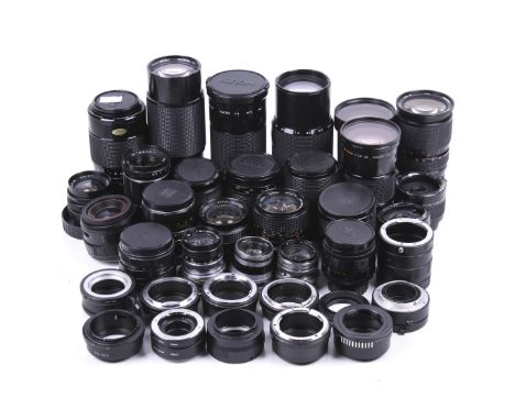 A large assortment of camera lenses and adaptors. Various brands and focal lengths including a Minolta 50mm f1.4 Rokkor, a Su
