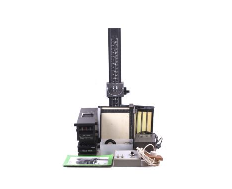 A Durst M605 6x6 medium format photographic darkroom enlarger, missing base board. With a Durst M605 Color head, four lenses;