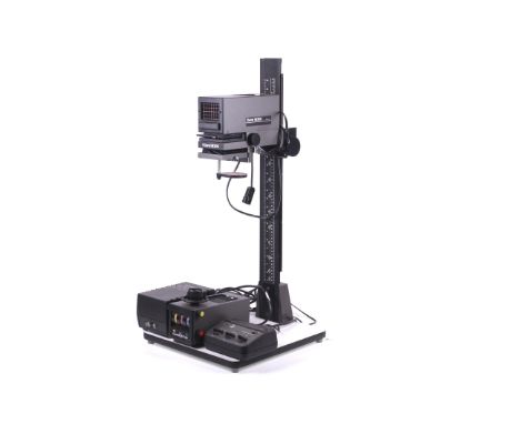 A Durst M305 35mm photographic darkroom enlarger. With black and white and colour heads, Durst 50mm f2.8 Neonon lens, Phillip