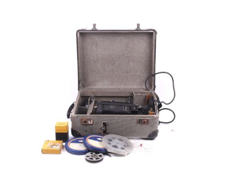 An Agfa Movector 8 8mm cine projector. Within case together with some film and accessories.