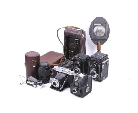 Five cameras and accessories. To include A LustreFlex TLR, a Lubitel 2, a Praktica 70-210mm f4-5.6 lens, a hand-held magic la