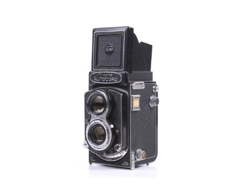 A Minolta Autocord 6x6 medium format TLR camera. Serial No. 367043. With a Minolta 75mm f3.5 Rokkor lens. Shutter release stu