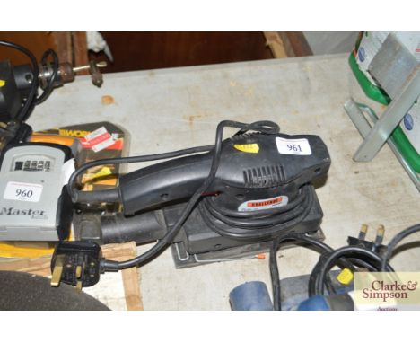A Challenge orbital sander and a Black &amp; Decker plane