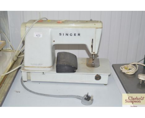 A Singer sewing machine - sold as collectors item 