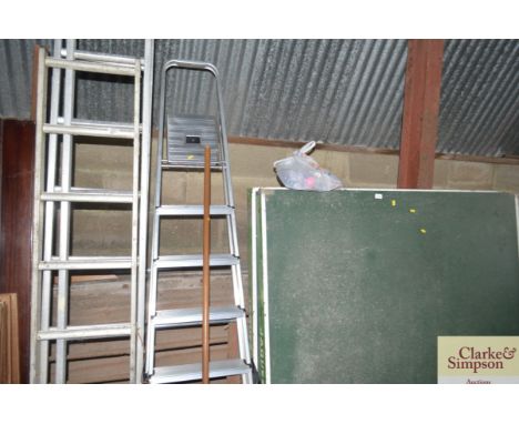 A rake and a step ladder