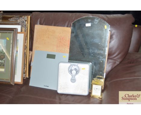 Two sets of scales; a bevel edged mirror; mantel clock etc.