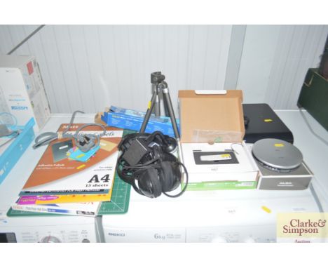 A Sky HD box and remote together with personal CD player, Jessops tripod, mailing labels etc 