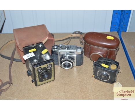 A Zeiss camera; a Brownie box camera and a baby Brownie