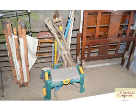 A quantity of long handled gardening tools etc