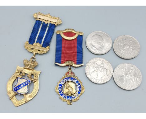 A silver gilt and enamel masonic jewel, together with another similar jewel and four crowns 