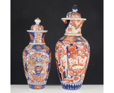 A quantity of Imari wares, including two covered vases, plates and a charger, the tallest vase 36cm (all damaged) (one box).