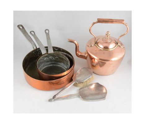 Two copper kettles, oval 23cm, round 32cm, horse brasses, a set of three copper saucepans diameter 15cm, 18cm and 25cm, 8cm d