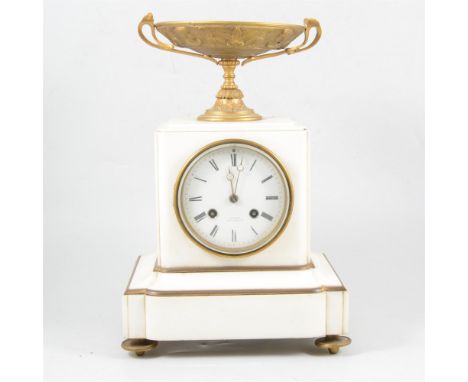 A white marble and gilt metal mantel clock, signed Charles Oudin, Palais Royal, Paris, white circular enamel dial with Roman 