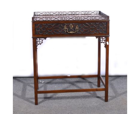 Chippendale revival mahogany silver table, with a fretwork gallery, single drawer with blind fretwork decoration, square sect