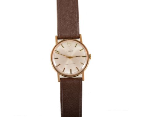 Rolex Tudor - a gentleman's shock-resisting 9 carat yellow gold wrist watch, circular light champagne baton dial with centre 