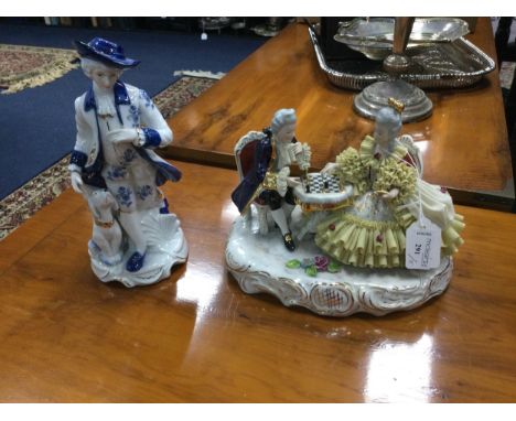 GERMAN CERAMIC GROUP OF THE CHESS PLAYERS, 24cm wide, along with four Leonardo Collection figures