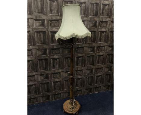 MAHOGANY STANDARD LAMP WITH SHADE, the cylindrical column with carved mid section and on a circular base