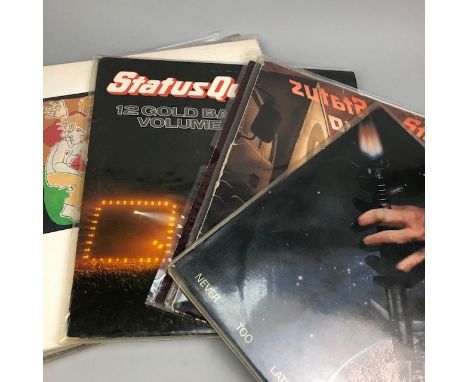COLLECTION OF RECORDS, including Status Quo, Michael Jackson, Buddy Holly, U2, The Police, The Beatles and UB40
